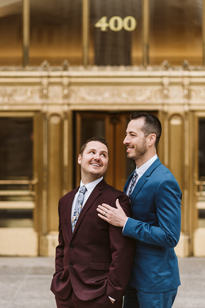 Gay couple engagement session at Wrigley Building Chicago